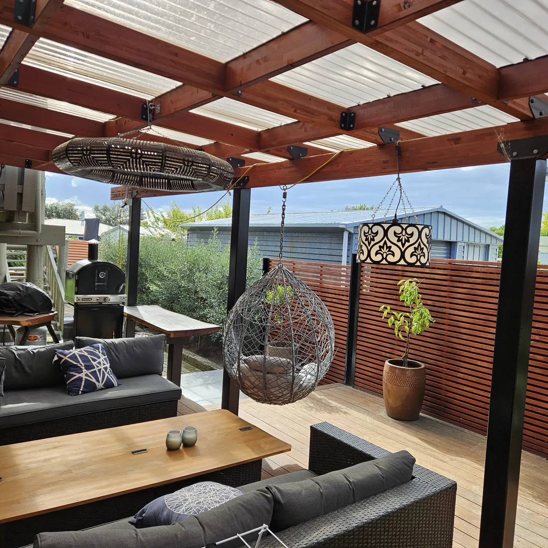Custom Positive Earth feature lights installed in a sheltered outdoor living area.
